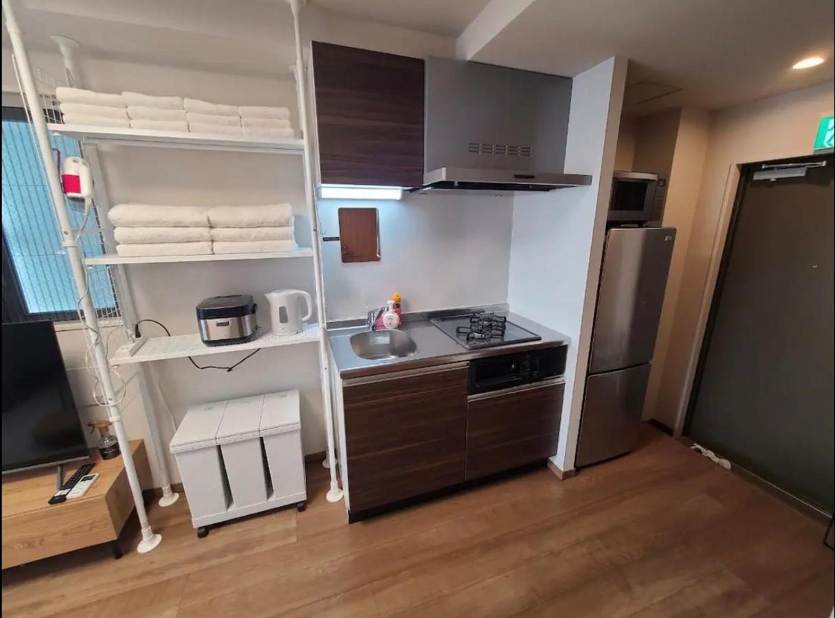 上野駅徒歩５分シングルベッド４台＋布団２セット1Ldk Apartamento Tóquio Exterior foto