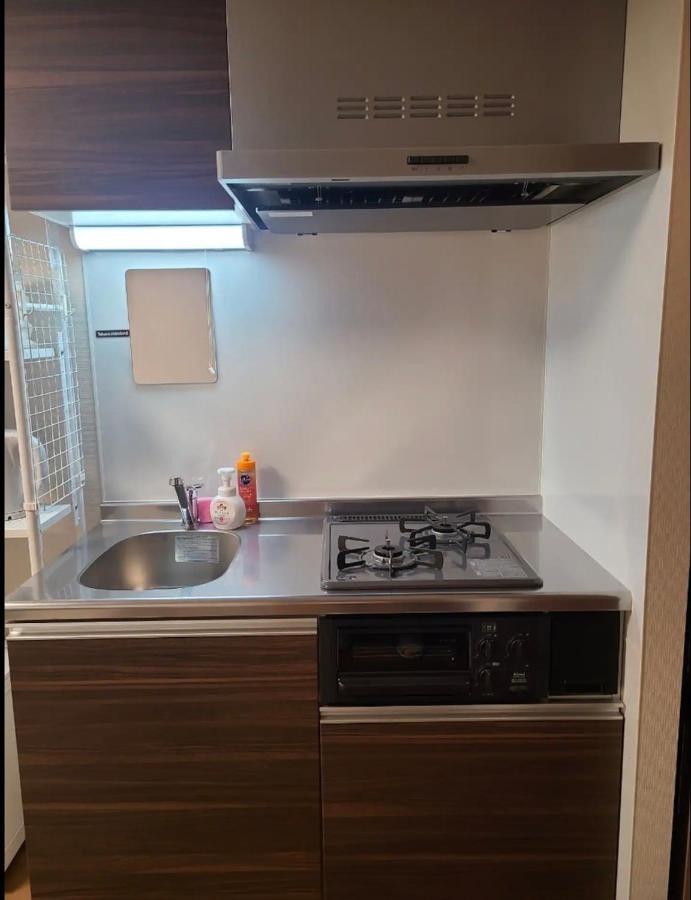 上野駅徒歩５分シングルベッド４台＋布団２セット1Ldk Apartamento Tóquio Exterior foto