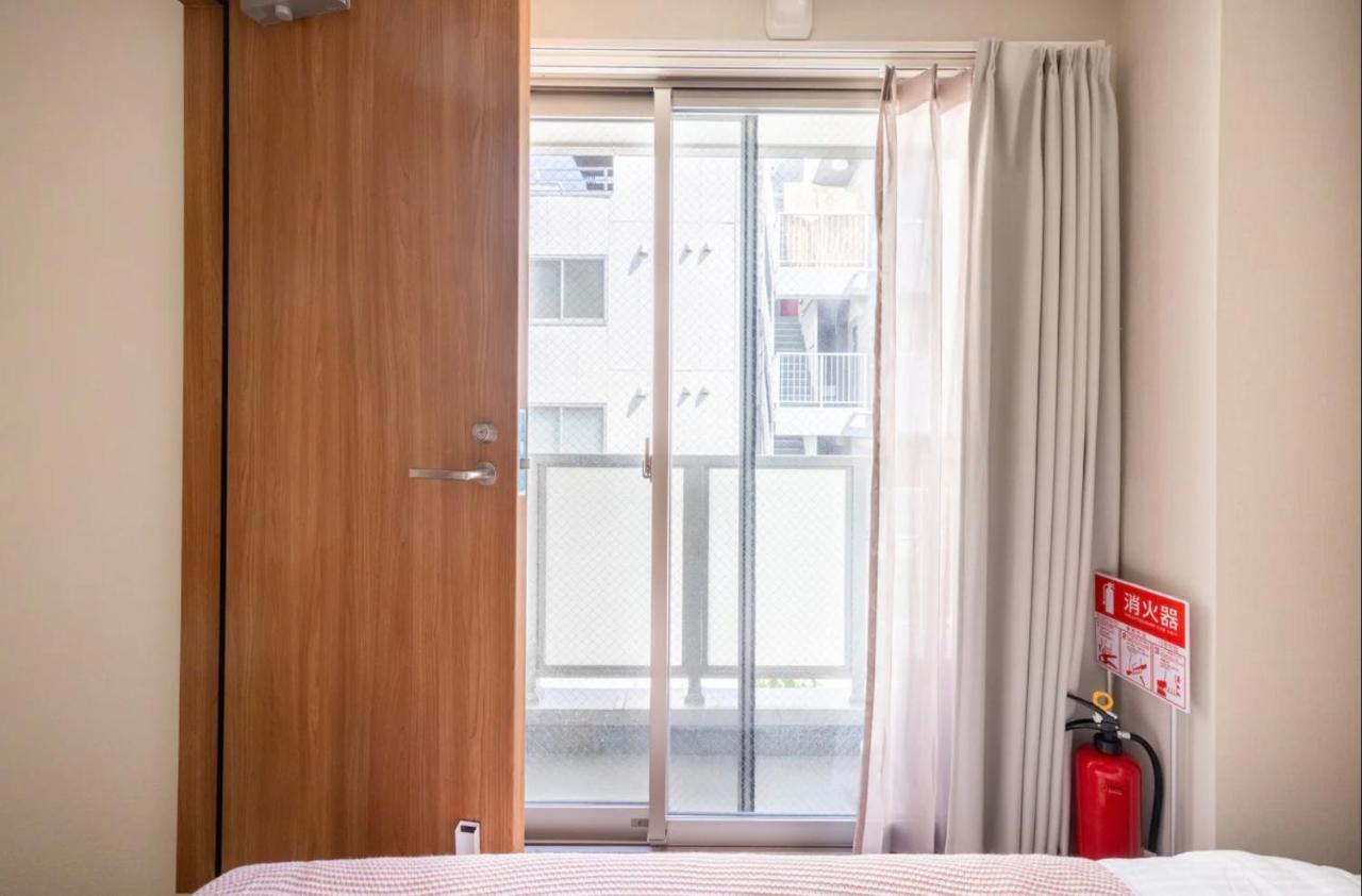 上野駅徒歩５分シングルベッド４台＋布団２セット1Ldk Apartamento Tóquio Exterior foto